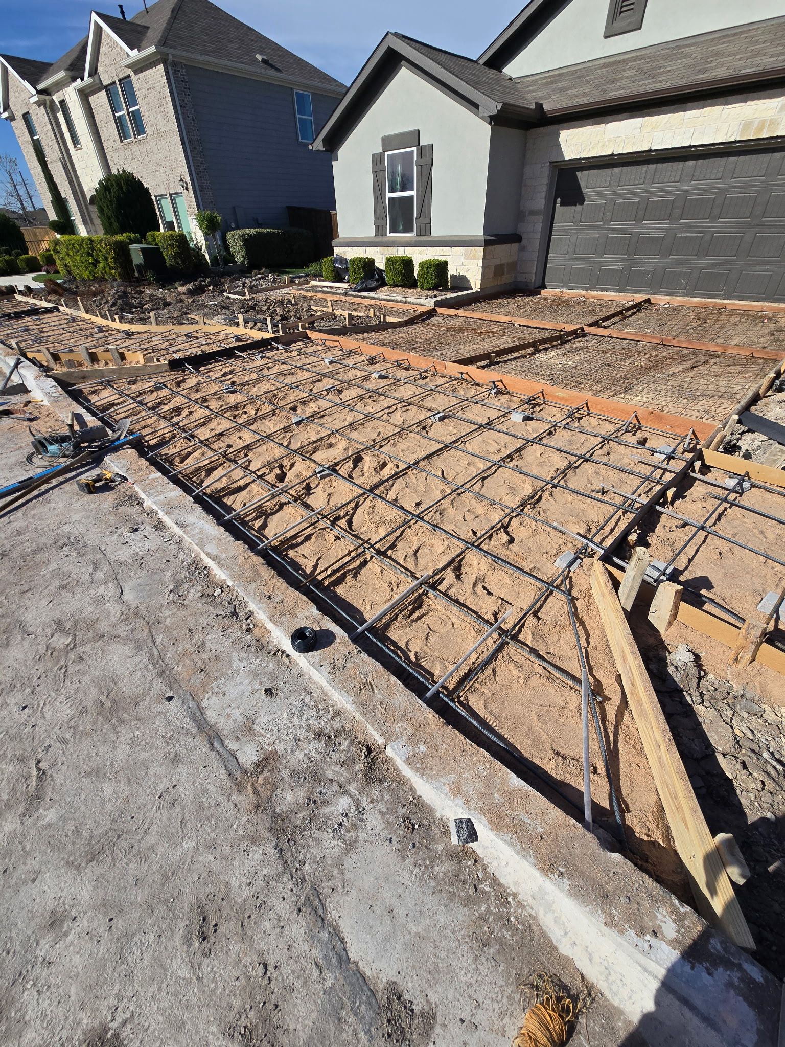 Driveway rebar grid with forms at residential home